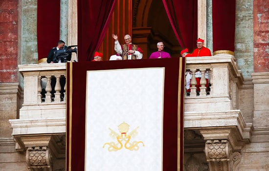 Pope Leo XIV addressing the public from the balcony of St. Peter's Basilica during his enthronement ceremony