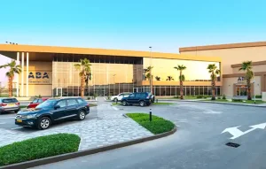 Image of a modern school in Oman with a clean, inviting environment, suitable for the education of immigrant children.